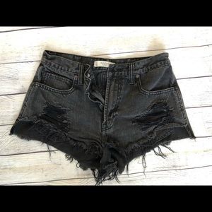 Frayed black denim shorts